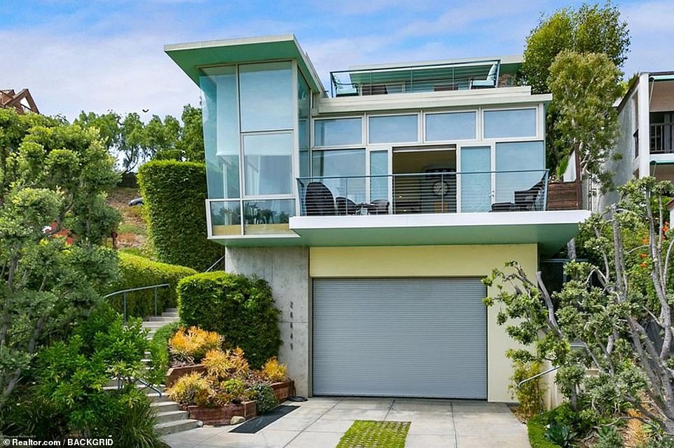 Beach house: Kristen Stewart is seeking to double her investment, as she puts her contemporary Malibu beach hideaway on the market for $9.5million, nine years after snatching it up