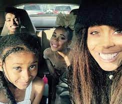 Erykah Badu with Seven and her daughters